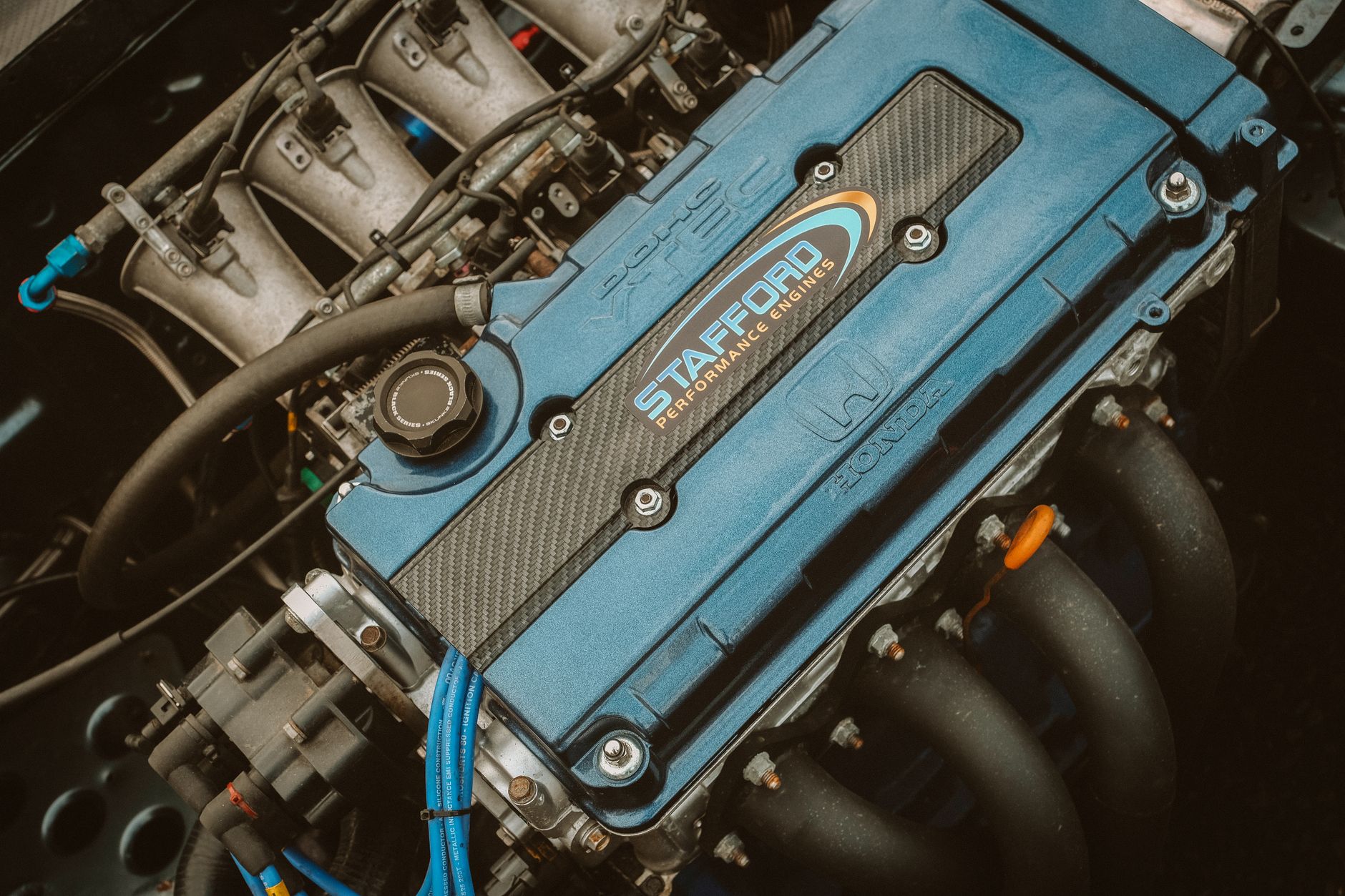 Close-up of a high-performance car engine showing mechanical components