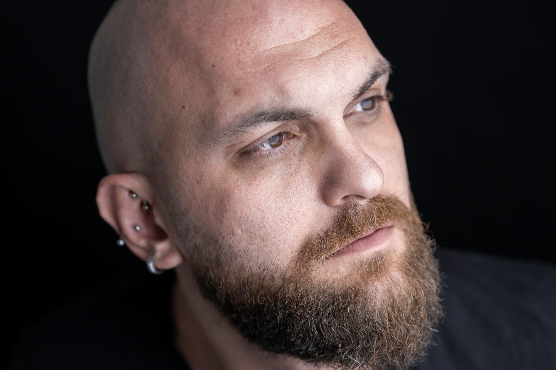 Close-up portrait of a man with a well-groomed beard