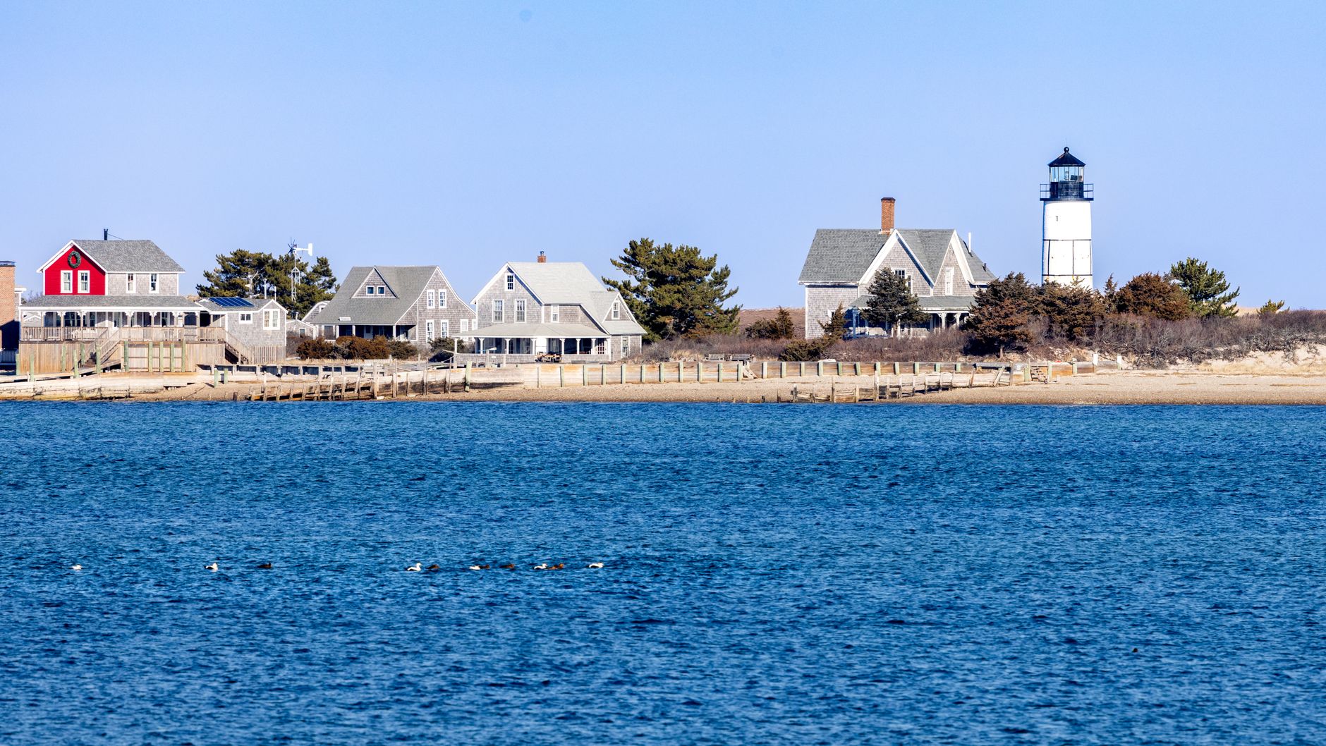 Misty coastal shoreline reminiscent of New England fog and seaside atmosphere