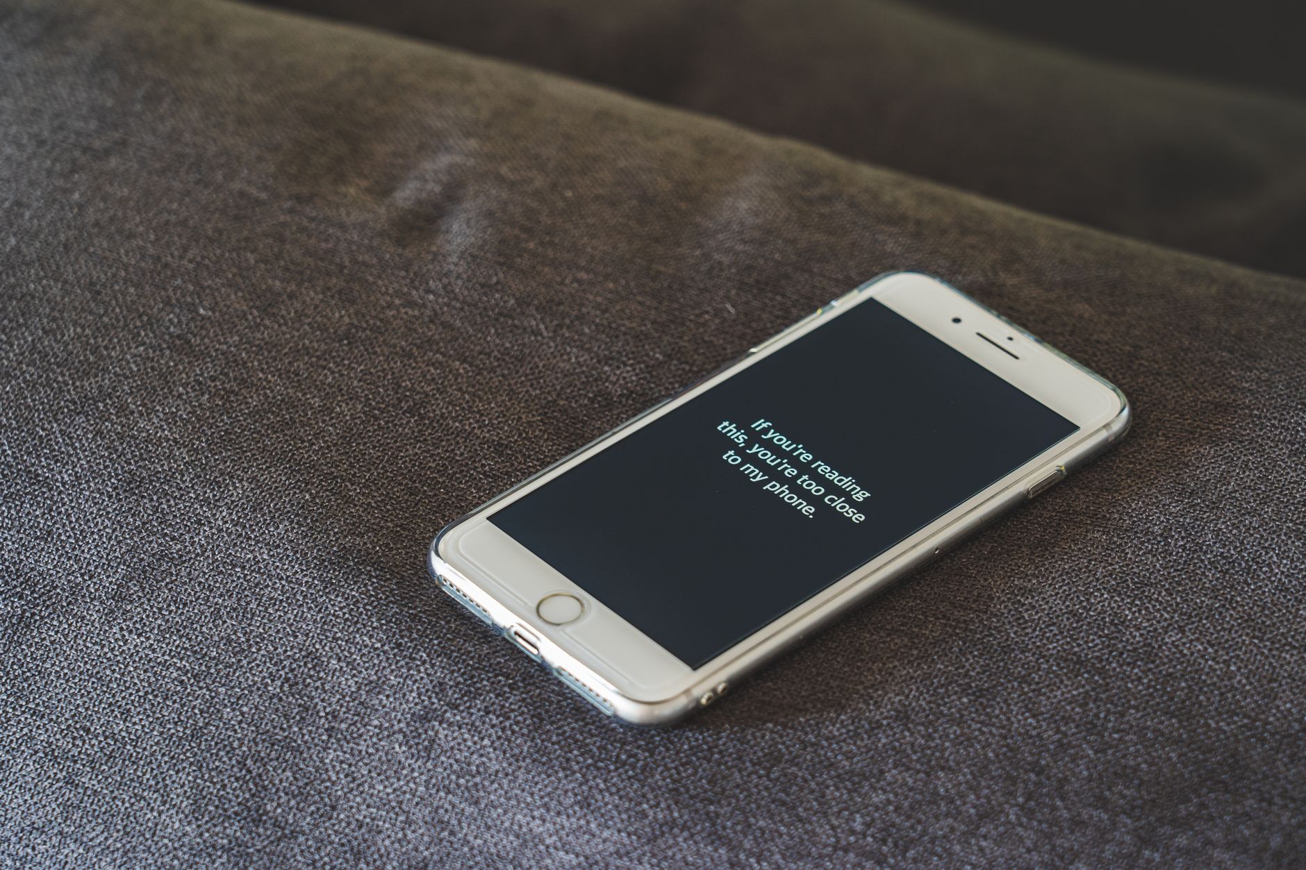 Person holding a smartphone with a privacy concern concept