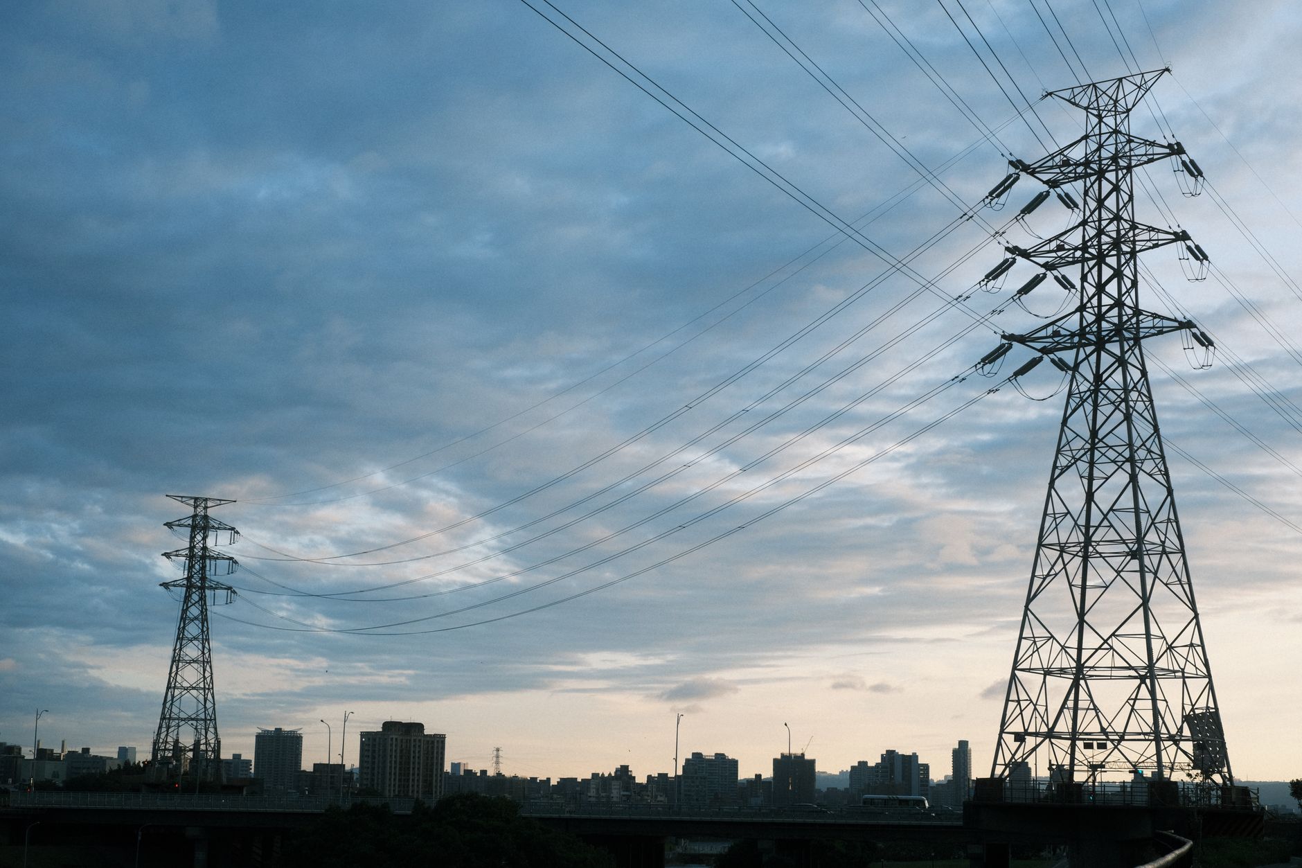 Urban skyline at dusk suggesting influence and financial power