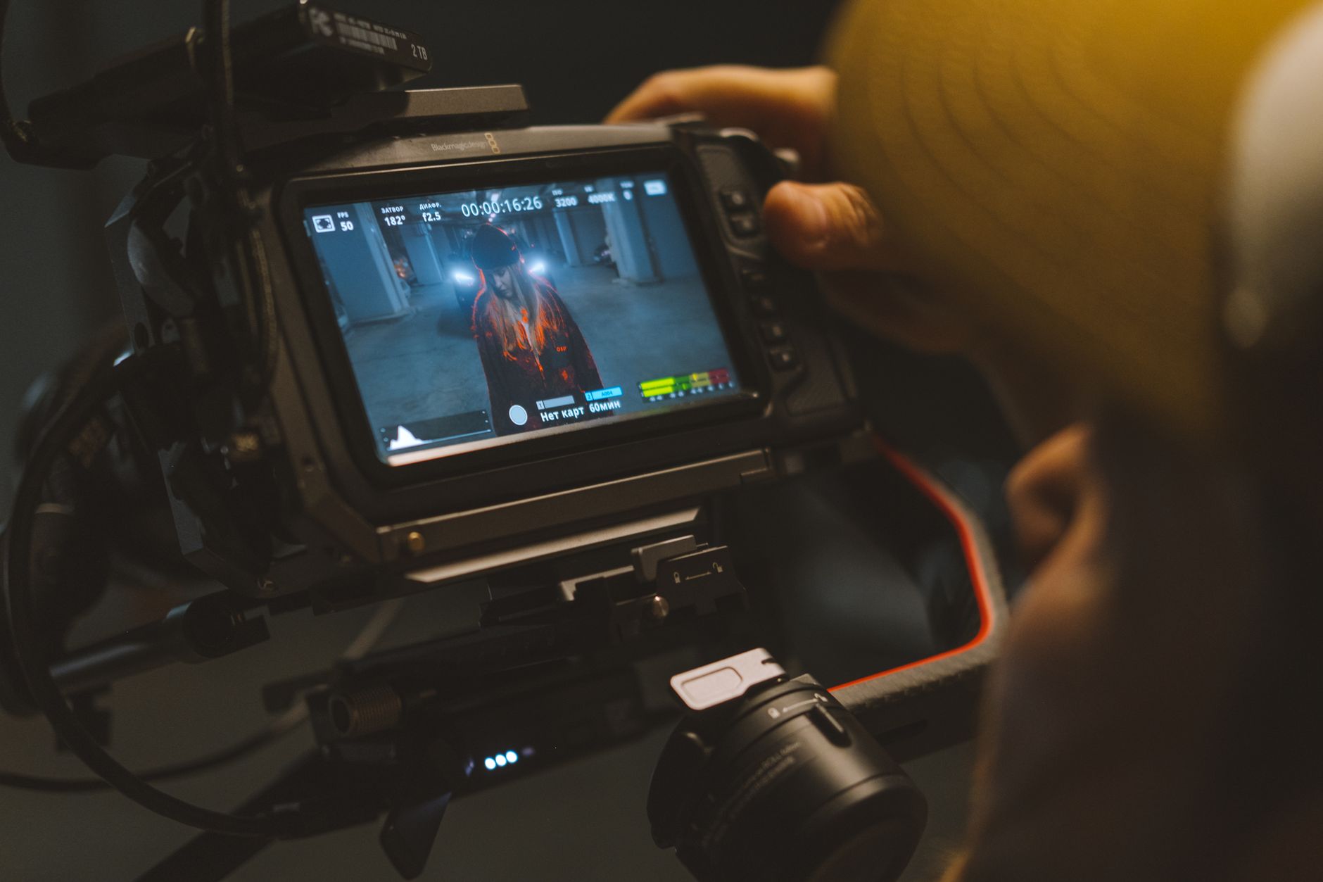 Behind-the-scenes film production with camera equipment and crew