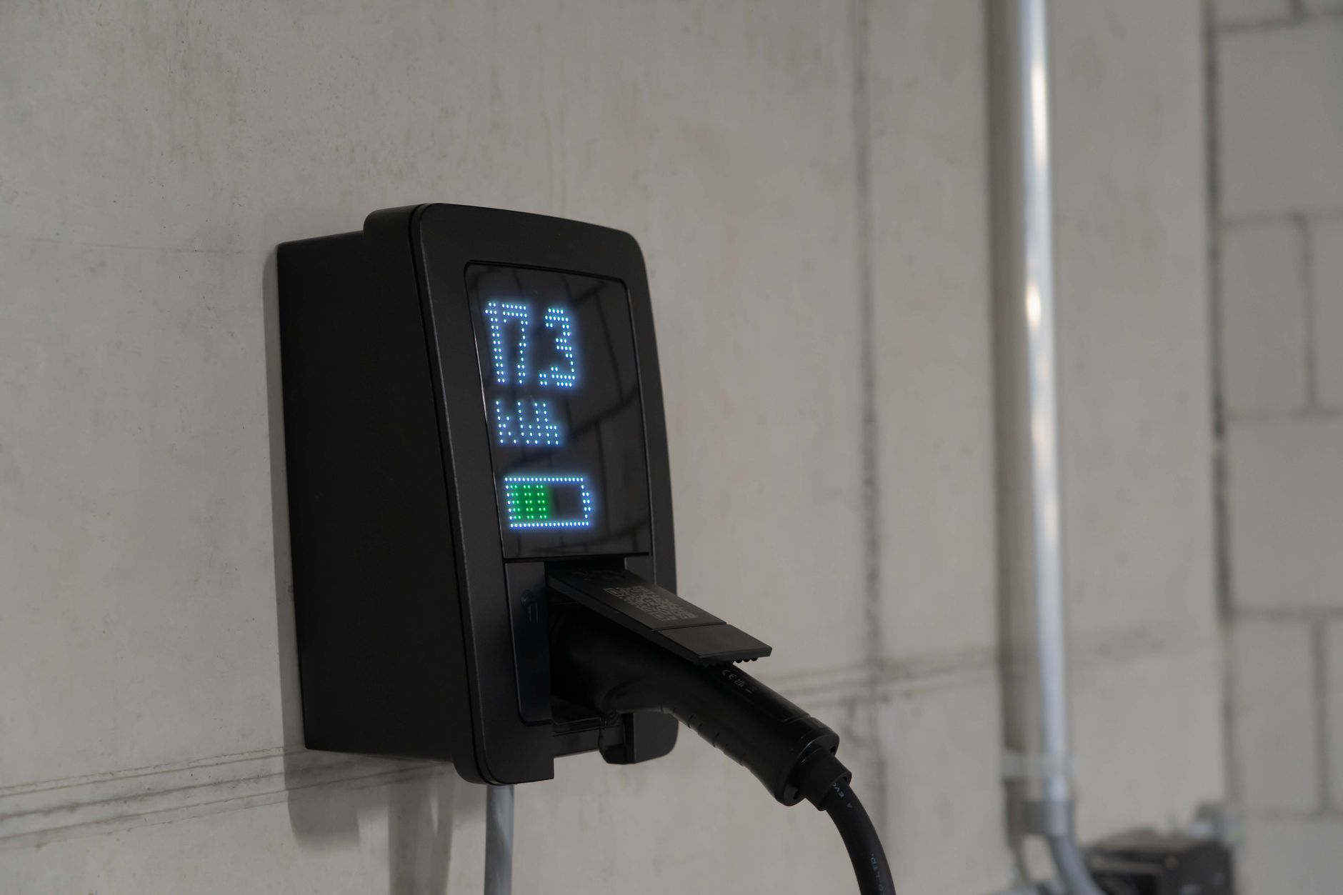 Industrial electric vehicle charging station at a commercial depot