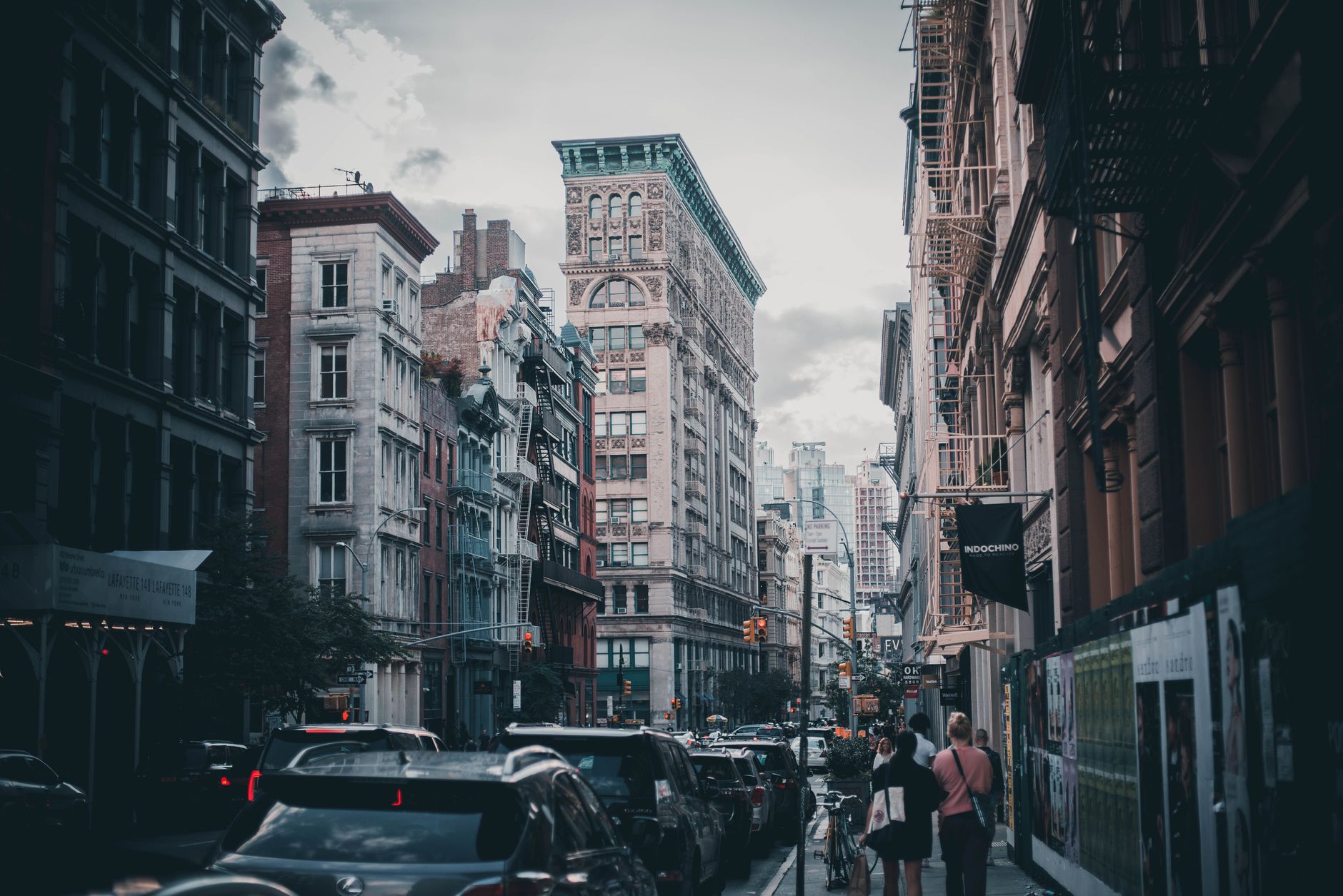 Pedestrians on a busy Greenwich Village street in New York City