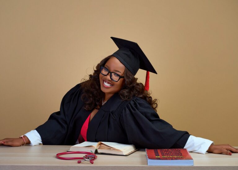 An open book resting on a wooden desk with soft natural light