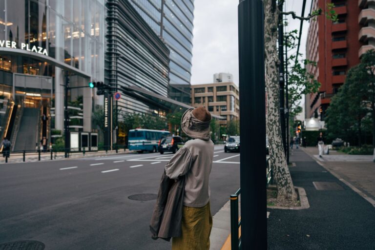 Stylish crowd gathered on a Tokyo street wearing layered sportswear and vintage pieces