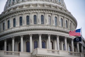 Exterior of the United States Capitol building under a clear sky
