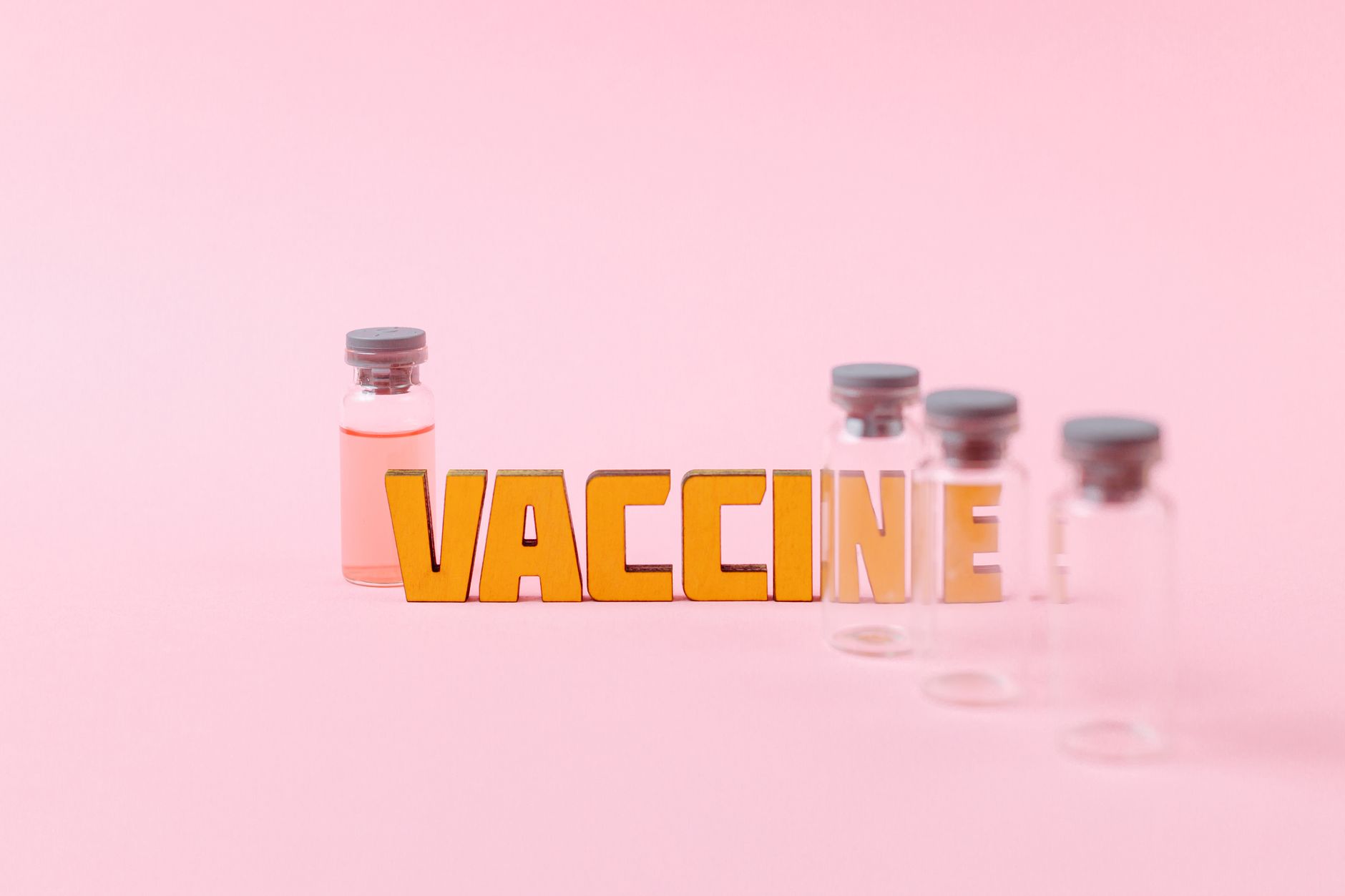 Healthcare worker preparing a vaccine dose in a clinical setting