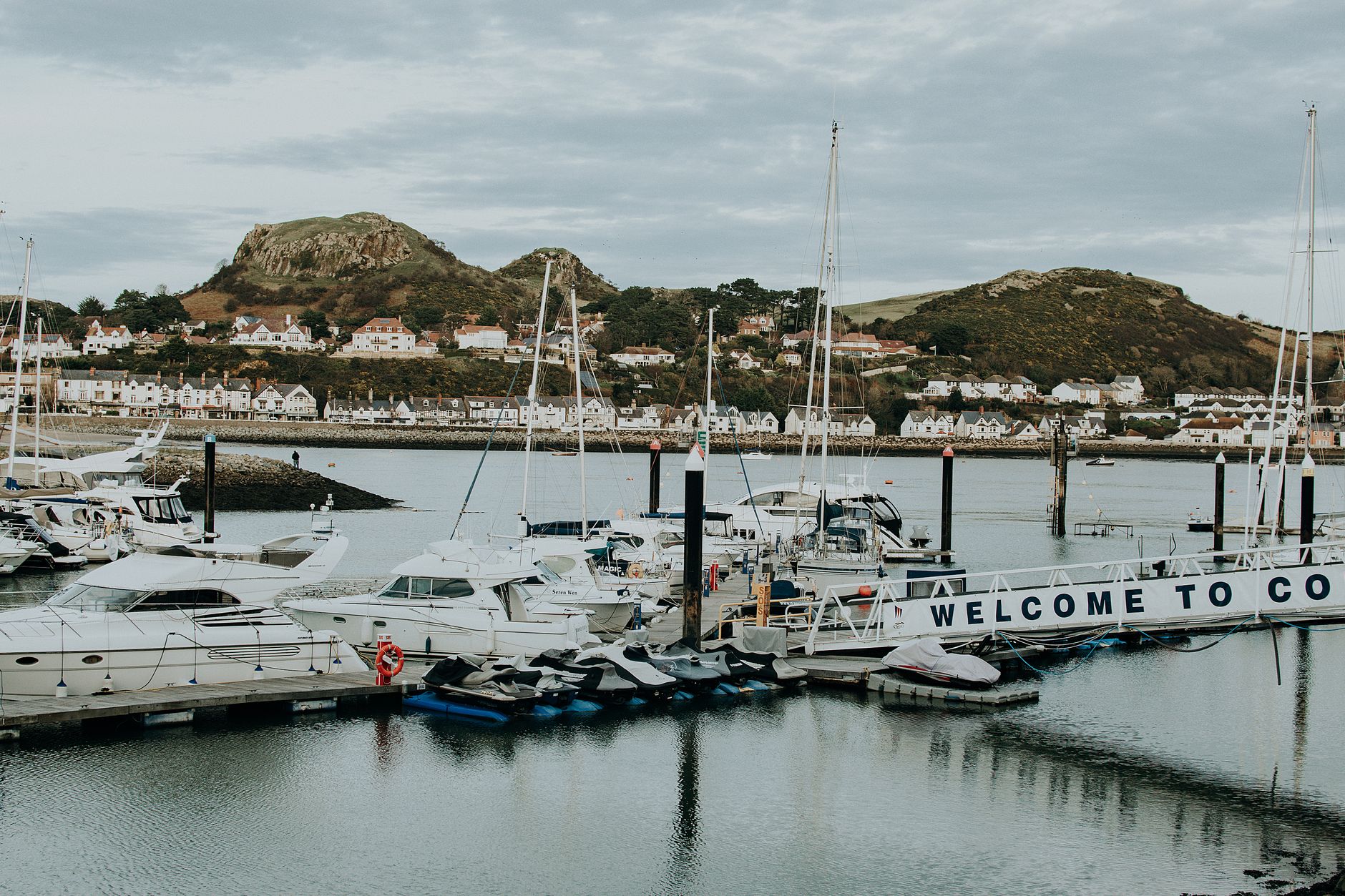 A grey overcast seafront in a small British coastal town