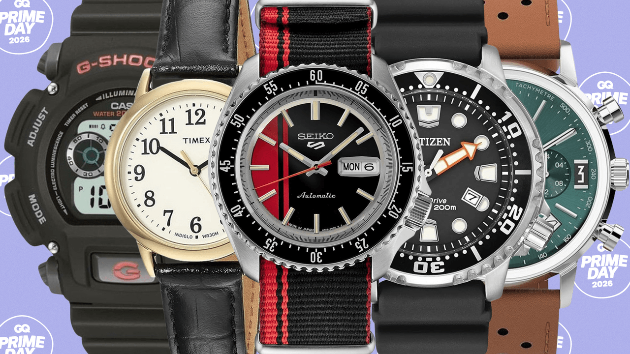 Close-up of a diver-style wristwatch on a neutral surface