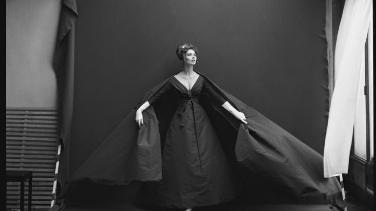 Black and white vintage fashion photograph suggesting mid-century editorial style